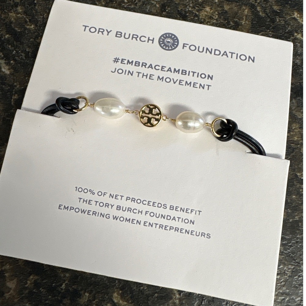 Tory Burch Foundation Embrace Ambition Black Cord Pearl Gold Logo Bracelet NEW